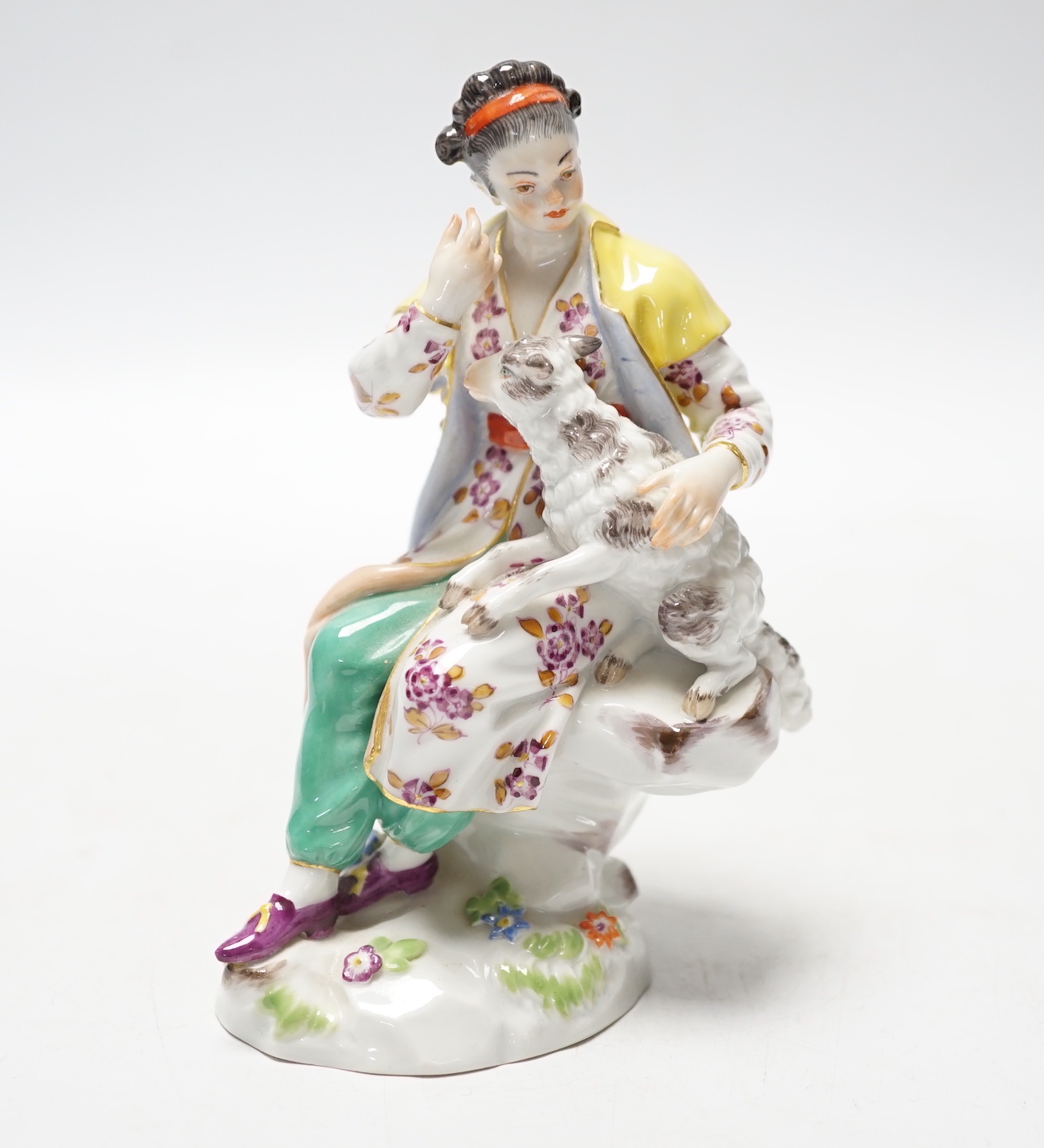 A Meissen group of a girl with a lamb, 20th century, 12.5cm